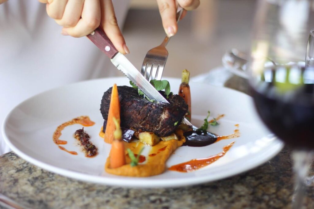 Braised short rib with roasted vegetables at Oscar's Restaurant Puerto Vallarta