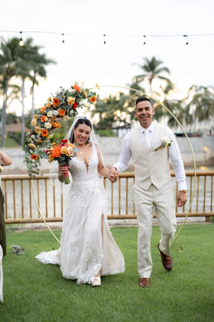 Newlyweds celebrating after their intimate ceremony at Oscar's Puerto Vallarta