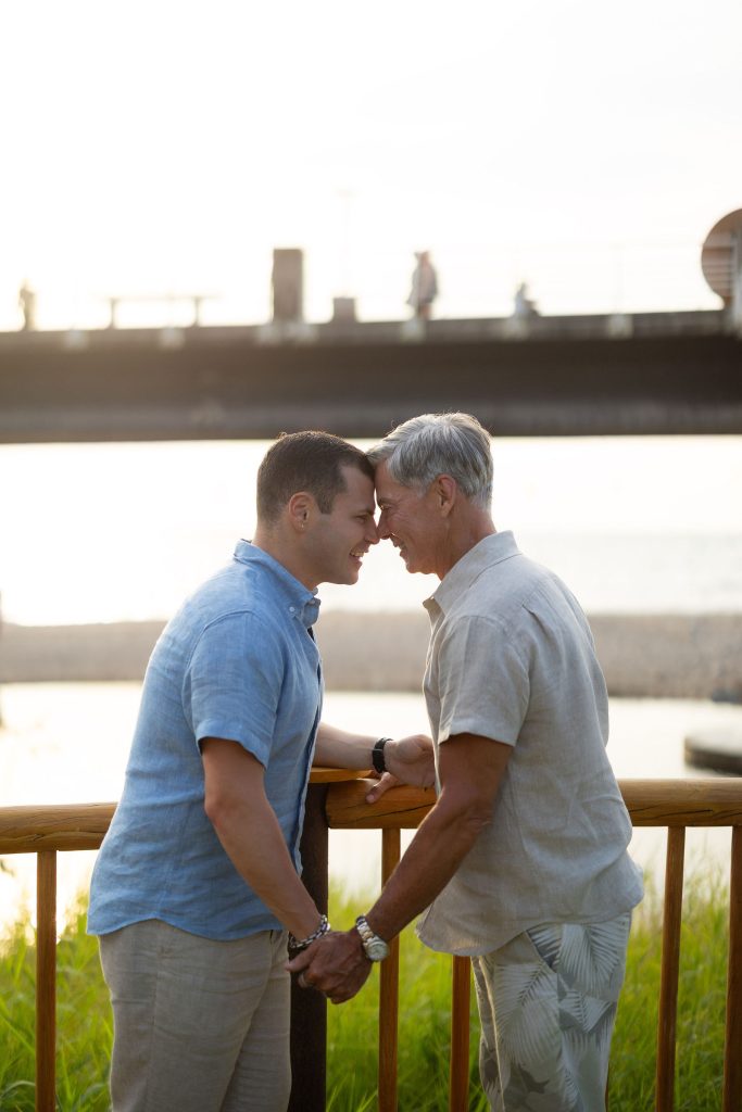 Couple by the railing with river view at sunset at Oscar's Puerto Vallarta