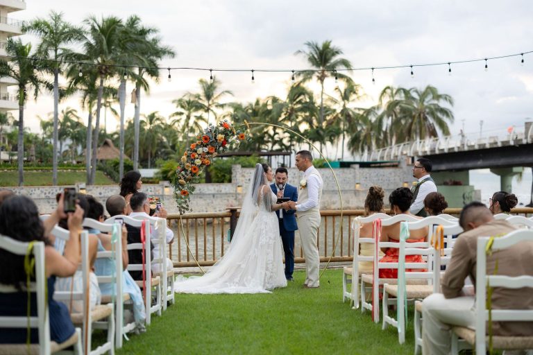 Intimate wedding ceremony in the garden by the Cuale River at Oscar's, Puerto Vallarta