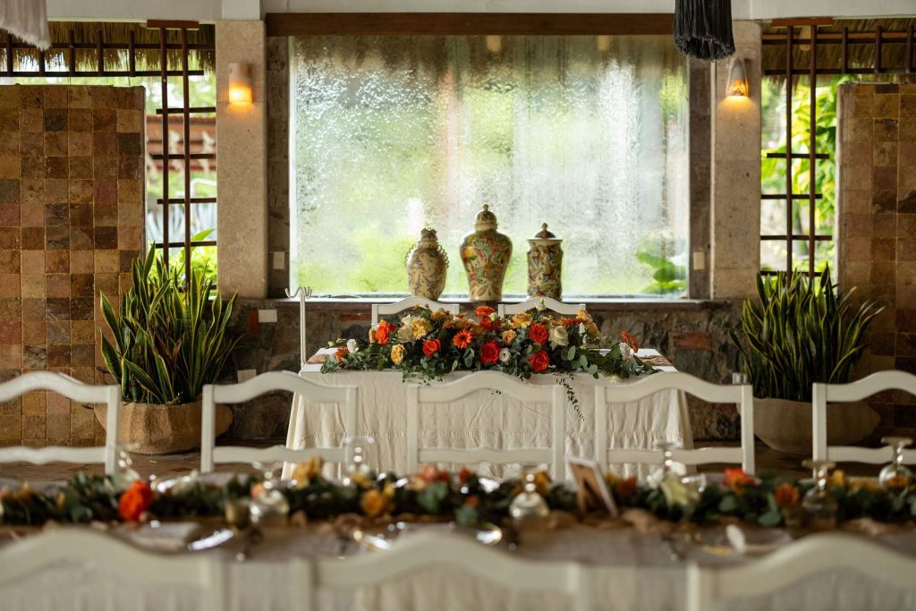 Wedding reception table under the palapa at Oscar's Puerto Vallarta