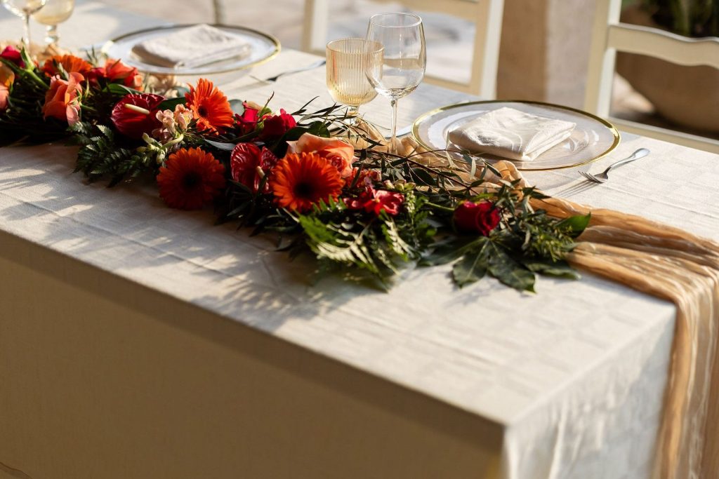Private dinner table with flowers at golden hour at Oscar's Puerto Vallarta